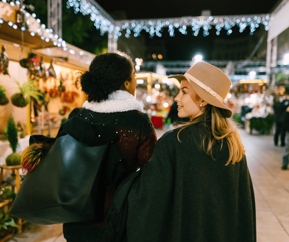 Two women Christmas shopping in London